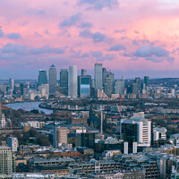 Buy canvas prints of Aerial sunset London cityscape with Canary Wharf in the background by Milton Cogheil