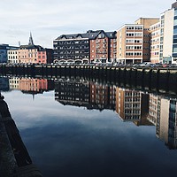 Buy canvas prints of Riverside reflection in Cork City, Ireland by Jennifer Crowley