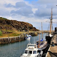 Buy canvas prints of Amlwch Harbour Anglesey Wales by Tom Curtis