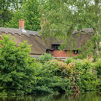 Buy canvas prints of River Cottage by Ann Mitchell