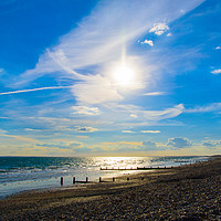 Buy canvas prints of Beach Sun Set with Bright Blue Sky by Neil Gregory