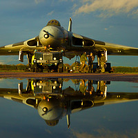 Buy canvas prints of Avro Vulcan Bomber, reflection. by martin pulling