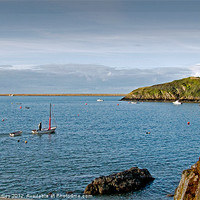 Buy canvas prints of Sailing across Fishguard Harbour in a small boat by john hartley