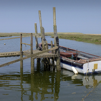 Buy canvas prints of Old Wooden Jetty - Thornham North Norfolk Coast by john hartley