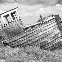 Buy canvas prints of Derelict  Wooden Fishing Boat at Thornham North No by john hartley