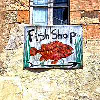 Buy canvas prints of Artistic Fish Shop Sign on a Character Wall by john hartley