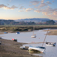 Buy canvas prints of Sunset over an ebbing tide at Burnham Overy Staith by john hartley