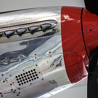 Buy canvas prints of Closeup P51 mustang engine cowling red spinner by Ashley Redding