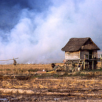 Buy canvas prints of Burning stubble in Laos by Phil Wingfield