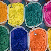 Buy canvas prints of Coloured powders in an Indian Market by Phil Wingfield