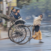 Buy canvas prints of Hand Pulled Rickshaw - Kolkata by Phil Wingfield