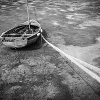 Buy canvas prints of Stranded rowing boat at low tide by Adam North