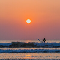 Buy canvas prints of Polzeath sunset surfer #1 by Simon Maycock