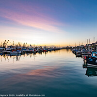 Buy canvas prints of Newlyn Harbour Sunrise by Simon Maycock
