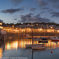 Buy canvas prints of Mousehole harbour reflections at night by Simon Maycock