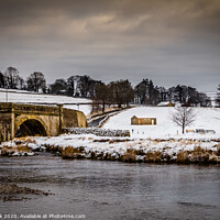Buy canvas prints of Burnsall in the snow by kevin cook