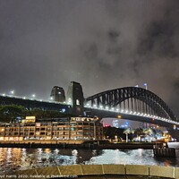 Buy canvas prints of Sydney Harbour Bridge in storm by Lloyd Harris