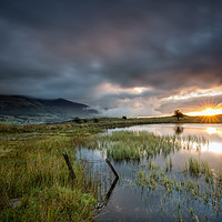 Buy canvas prints of Sunrise at Tewet Tarn by Phil Buckle