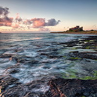 Buy canvas prints of Bamburgh Castle Sunrise by Phil Buckle