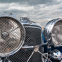Buy canvas prints of Large lights, grills and chrome by Alf Damp