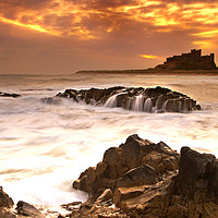 Buy canvas prints of Bamburgh Rock by Ken Cowins