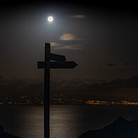 Buy canvas prints of Signpost by moonlight by David O'Brien