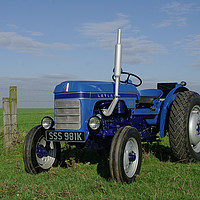 Buy canvas prints of Leyland 154 vintage tractor by Alan Barnes