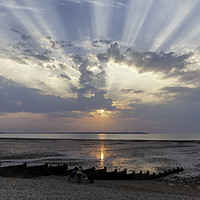 Buy canvas prints of Crepuscular Rays over Whitstable Beach by Kentish Dweller