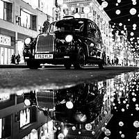 Buy canvas prints of Taxi on Oxford Street by Jon Raffoul