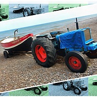 Buy canvas prints of Cromer Beach Tractor by David Mccandlish