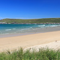 Buy canvas prints of Crantock Bay in Cornwall, Panoramic by Carl Whitfield