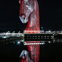 Buy canvas prints of Majestic Red Kelpie Statue at Night by Mathew Rooney