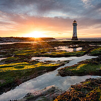 Buy canvas prints of Sunset at New Brightons Perch Rock Lighthouse by Andrew George
