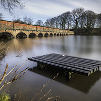 Buy canvas prints of Carr Mill Dam and the 19 Arch Bridge  by Andrew George