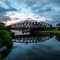 Buy canvas prints of The Sutton Weaver Swing Bridge  by Andrew George