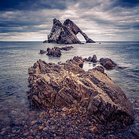 Buy canvas prints of Bow Fiddle Rock Formation at Portknockie by John Frid