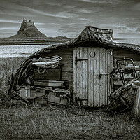 Buy canvas prints of Lindisfarne Boatshed and Castle by John Frid