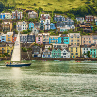 Buy canvas prints of Serene Sailing Amidst Colourful Riverside Houses by Paul F Prestidge