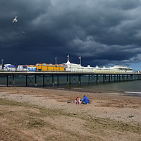 Buy canvas prints of   Paignton Pier with Storm Approaching             by Paul F Prestidge