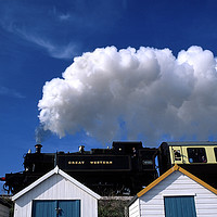 Buy canvas prints of Steam Train over the Beach Huts by Paul F Prestidge