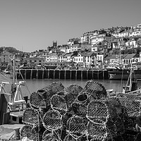 Buy canvas prints of Brixham Harbour with Crab Pots in Monochrome by Paul F Prestidge