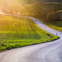 Buy canvas prints of Road in a tuscan landscape at sunset  by Marco Bicci