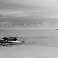 Buy canvas prints of A filipino boat with a fisherman at the horizon by Marco Bicci