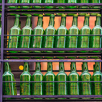 Buy canvas prints of Empty green bottles by Marco Bicci