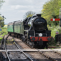 Buy canvas prints of Steam Train Arriving at Station  by Alan Barr