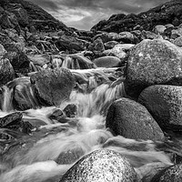 Buy canvas prints of Stream Into Porth Nanven in Black and White by Jennifer Higgs