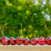 Buy canvas prints of Cherry ripe red natural background.  by Yury Petrov