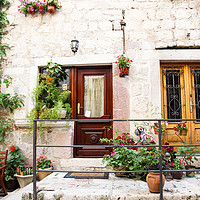 Buy canvas prints of Doors on Kotor Porch by Darryl Brooks