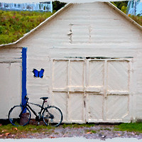 Buy canvas prints of Bike Against Garage by Darryl Brooks