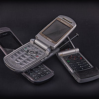 Buy canvas prints of Three Flip Phones on Black by Darryl Brooks